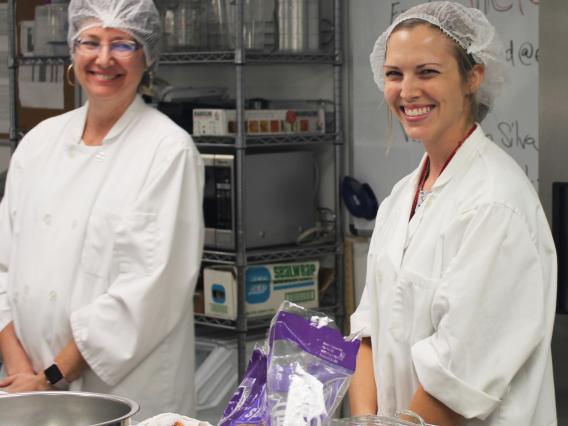 Two women making smoothies in NSC food lab